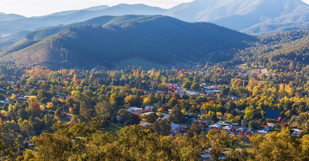 AU Private Tours High Country Beautiful countryside town in autumn aerial panorama Bright Victoria